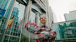 Portrait of Woman with European Flags near EU Parliament in Brussels, Belgium