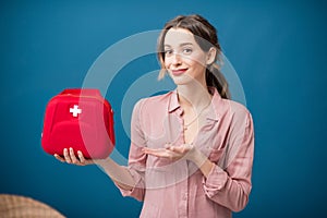 Woman with first aid kit