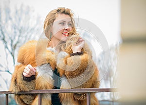 Portrait of woman in fur coat, modern woman life