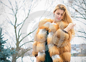 Portrait of woman in fur coat, modern woman life