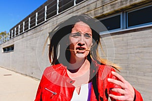 Portrait of woman with gesture of fear and fright when witnessing an accident