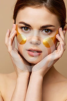 portrait woman golden patches on the face  background