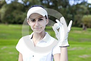 Portrait of a woman with golf ball