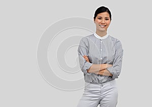 Portrait of woman with grey background