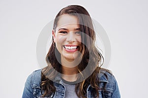 Portrait, woman and happy with smile by studio background for mockup space, comic joke and excited expression. Face