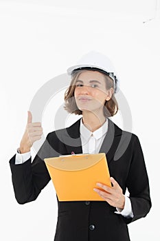 Portrait of a woman in hard hat and suit