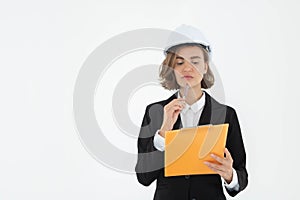 Portrait of a woman in hard hat and suit