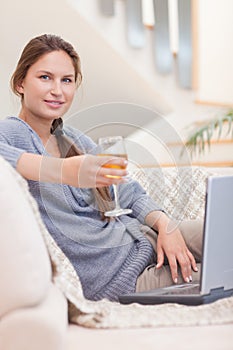 Portrait of a woman having a glass of wine