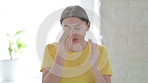 Portrait of Woman having Headache