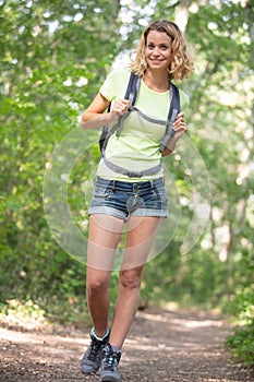portrait woman hiker looking at camera smiling