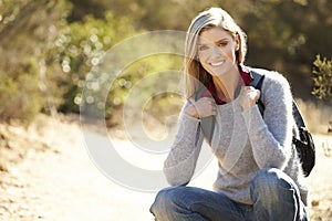 Portrait Of Woman Hiking In Countryside