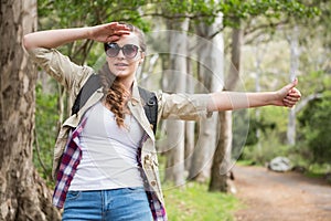 Portrait of woman hitch hiking