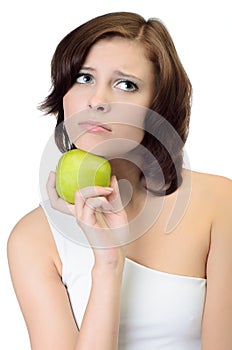 Portrait of woman holding apple