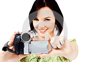 Portrait of woman holding home video camera