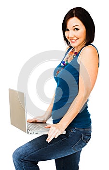 Portrait of woman holding laptop