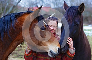 Portrait woman and horses in outdoor. Woman