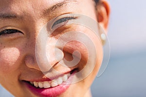 portrait of a woman with invisible braces smiling