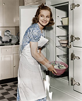 Portrait of woman in kitchen photo