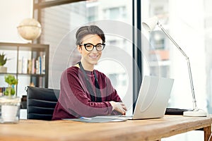 Portrait, woman and laptop in office with happiness for career, job growth and opportunity in confidence. Female