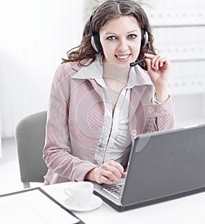 Portrait of a woman operator of a call center