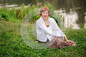 Portrait of the woman outdoors