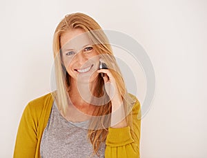 Portrait, woman and phone call for contact, communication and talking with smile isolated on white background. Happy