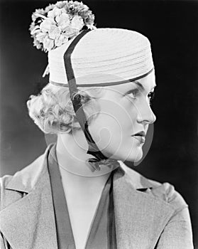 Portrait of a woman with a pillbox hat