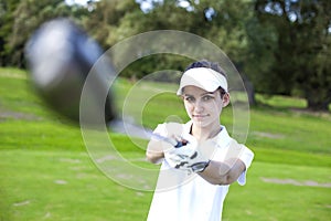 Portrait of a woman playing golf