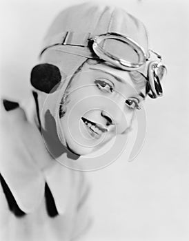 Portrait of woman in racing hat and goggles