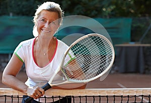Portrait, woman and racket in tennis court for sports training, workout and game or competition, exercise and fitness