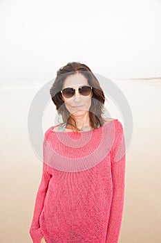 Portrait woman in red at beach