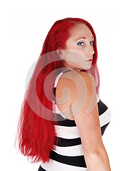 Portrait of woman with red hair.