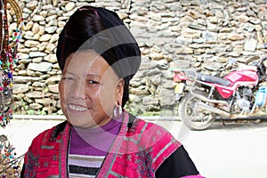 Portrait of a smiling woman of the Red Yao hill tribes, Longsheng, China