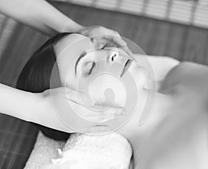 Portrait of a woman relaxing on a spa massage