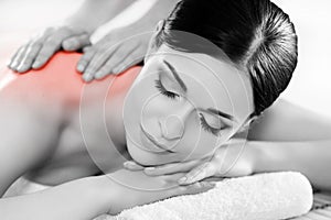 Portrait of a woman relaxing on a spa massage