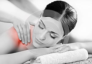 Portrait of a woman relaxing on a spa massage