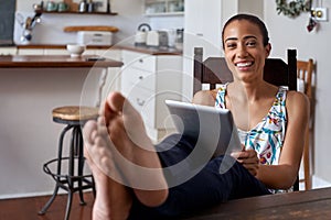 Portrait woman relaxing tablet