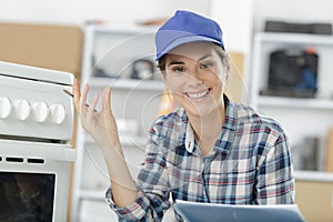 Portrait woman repairing electrical appliance