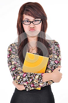 Portrait of woman scowling and hugged blank books, isolated on w