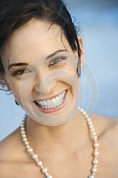 Portrait of woman smiling.