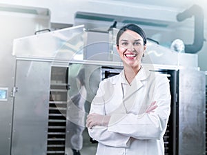 Female engineer in front of Food Dryer Dehydrator Machine