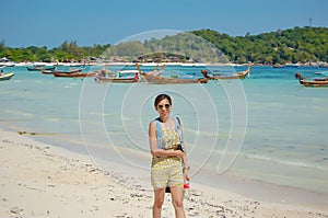 Portrait woman are Stroll the beach , Koh Lipe.