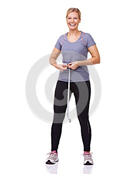 Portrait, woman and tape measure for fitness with weight loss progress, happy and exercise results in studio. Person