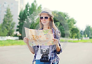 Portrait woman tourist sightseeing city with paper map