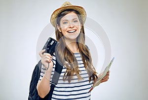 Portrait of woman traveler with camera