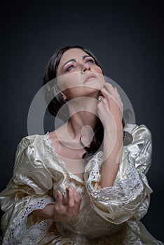 Portrait of woman in vintage dress