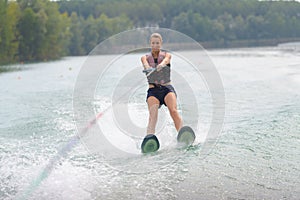 Portrait woman water skiing