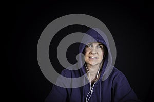 A portrait of a woman wearing a hoodie