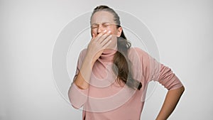 Portrait of a woman who funny sneezes