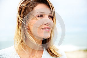 Portrait of woman with wind in the hair